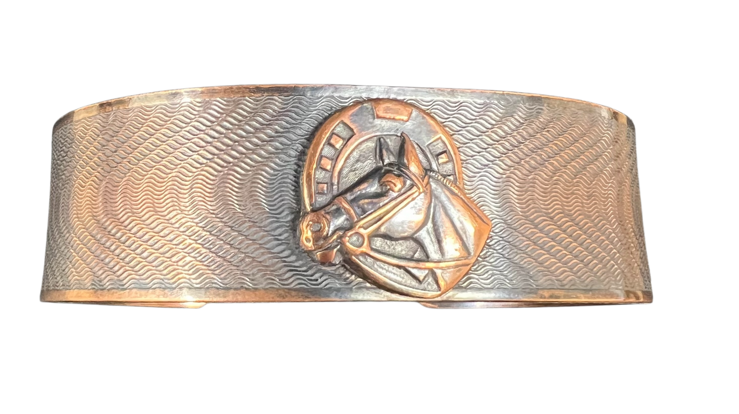 Copper horse cuff chevron pattern background