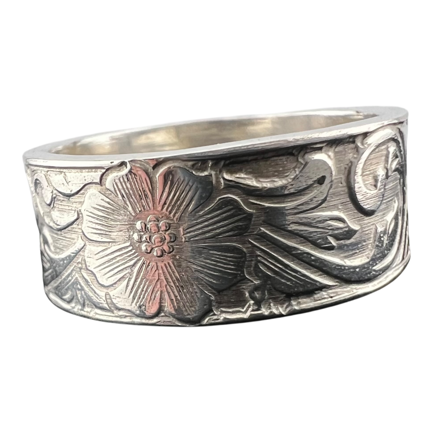 Sterling silver ring featuring a flower pattern
