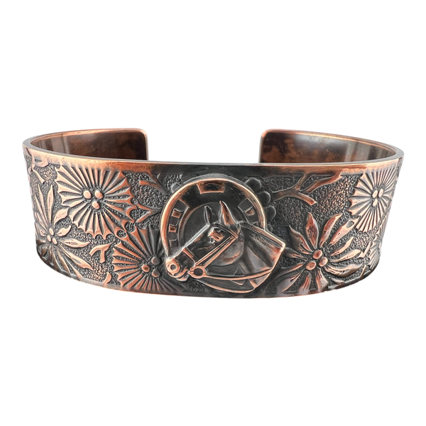 Horse on floral starburst copper cuff