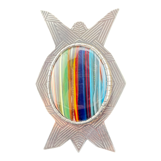 Geometric pendant in sterling silver with a colorful surfite cabochon