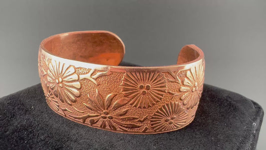Video of Copper cuff with flowers in a st